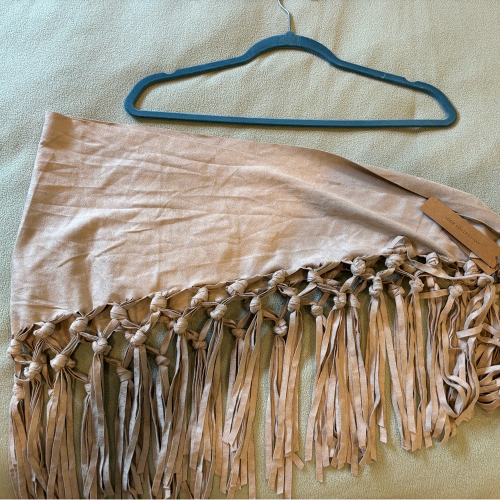 New. One size. With summer coming fun little sassy cover up.